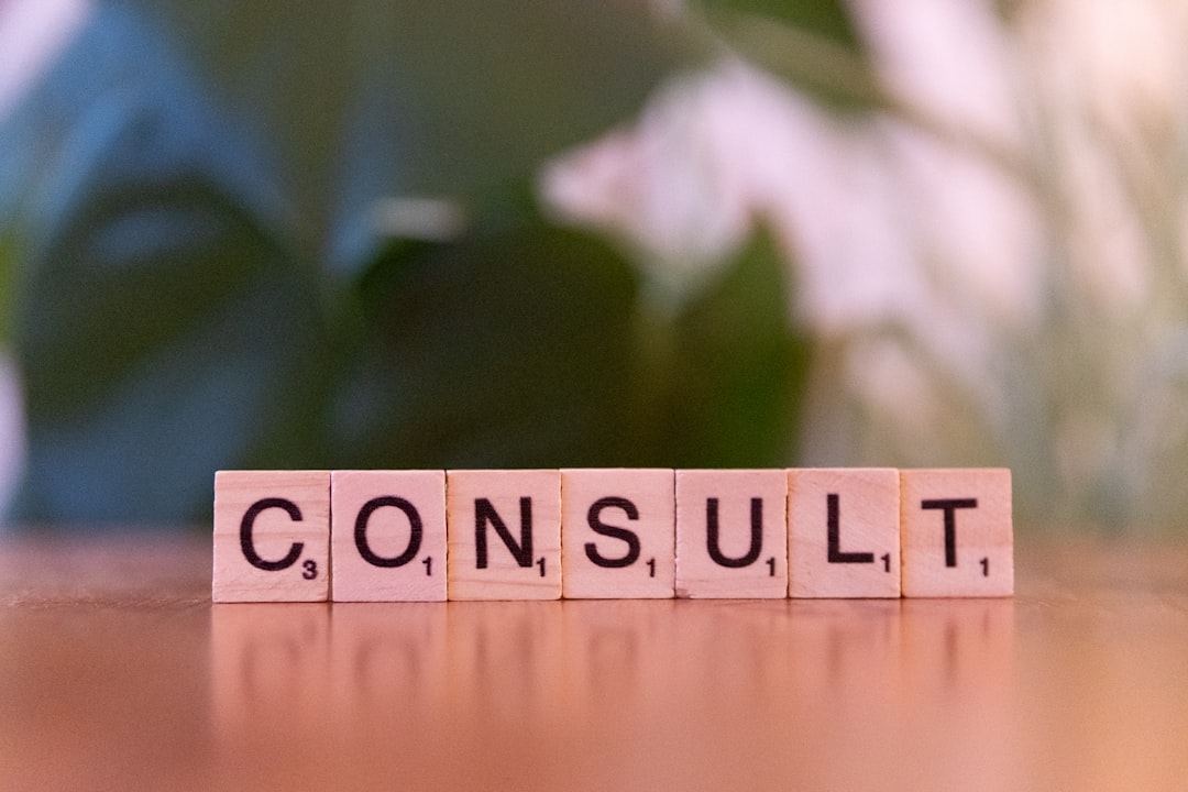 a-wooden-block-spelling-consulting-on-a-table-sewbkddizli